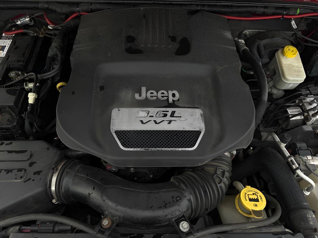 used 2013 Jeep Wrangler Unlimited car, priced at $10,266