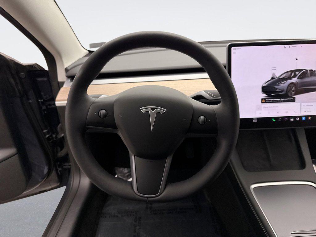 used 2023 Tesla Model 3 car, priced at $27,299