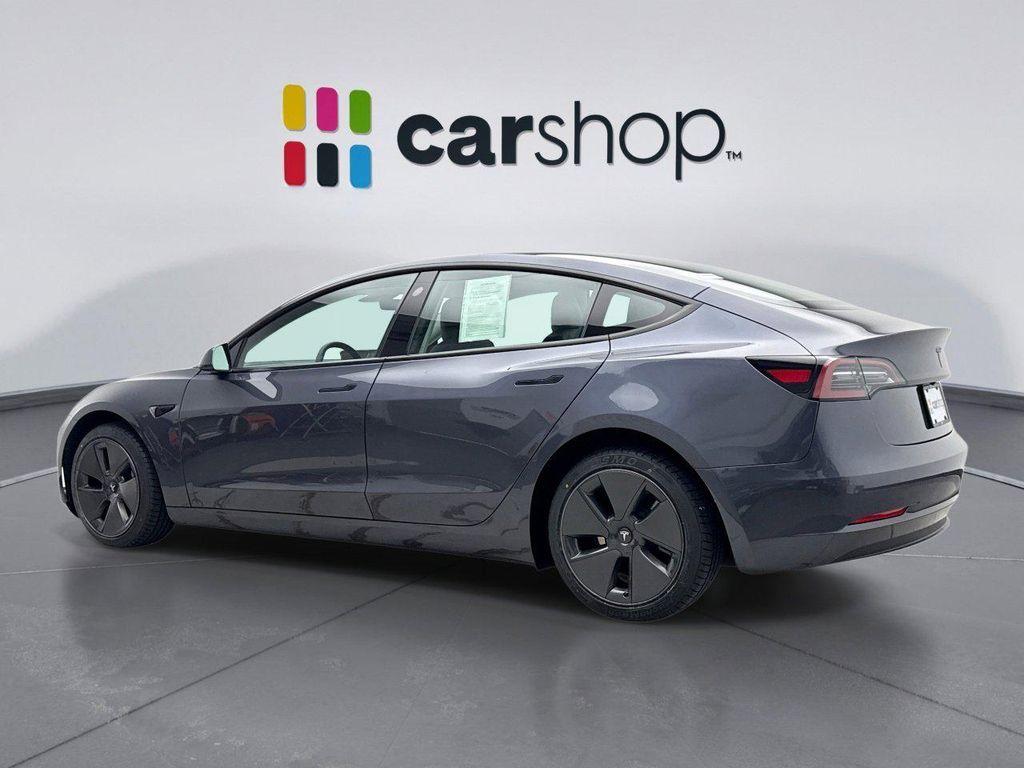 used 2023 Tesla Model 3 car, priced at $27,299