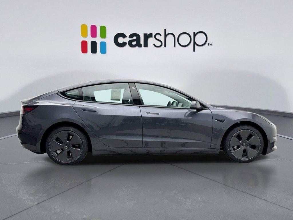 used 2023 Tesla Model 3 car, priced at $27,299
