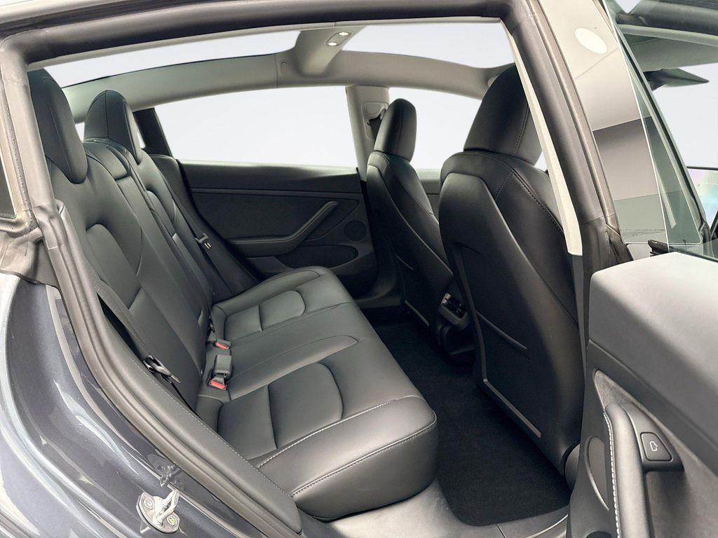 used 2023 Tesla Model 3 car, priced at $27,299