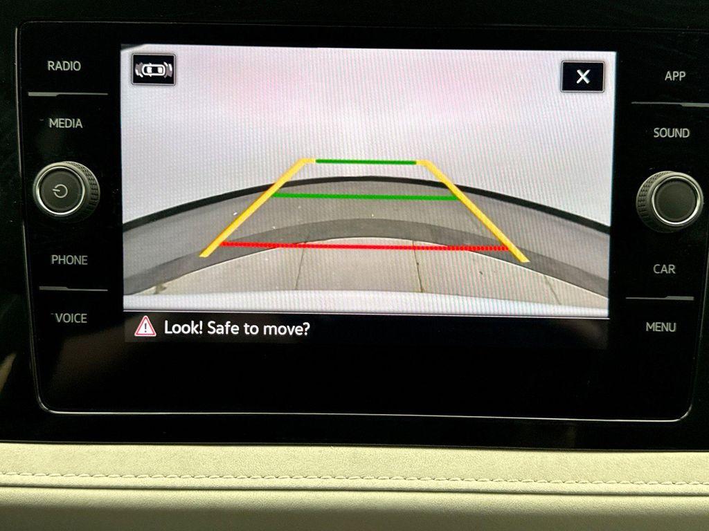 used 2025 Volkswagen Taos car, priced at $26,300