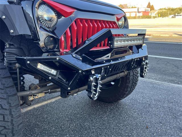 used 2015 Jeep Wrangler Unlimited car, priced at $15,748