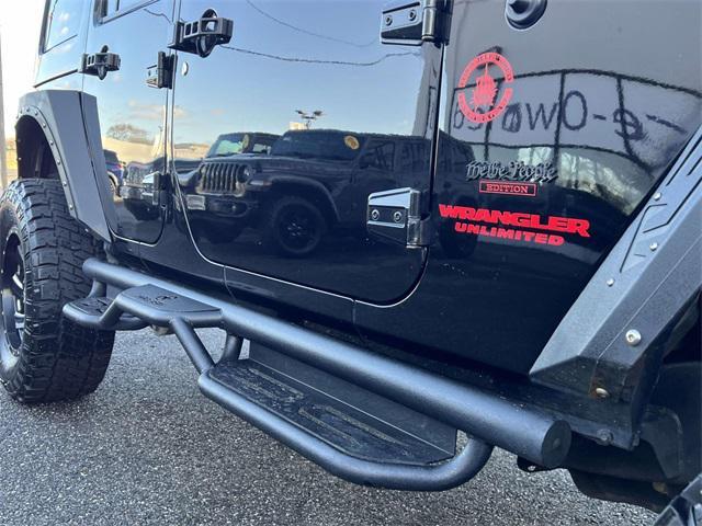 used 2015 Jeep Wrangler Unlimited car, priced at $15,748