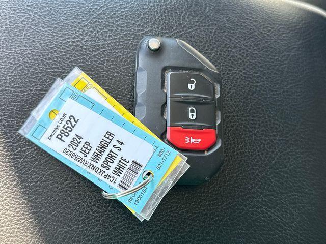 used 2024 Jeep Wrangler car, priced at $33,468