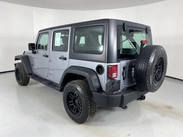 used 2013 Jeep Wrangler Unlimited car, priced at $10,873