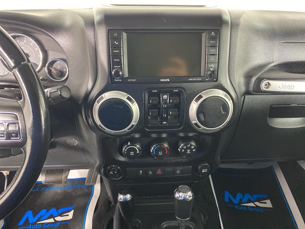 used 2015 Jeep Wrangler Unlimited car, priced at $18,125