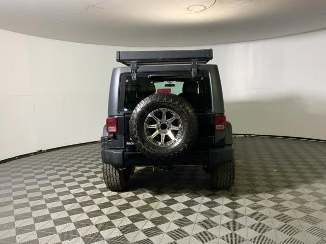 used 2014 Jeep Wrangler Unlimited car, priced at $12,882