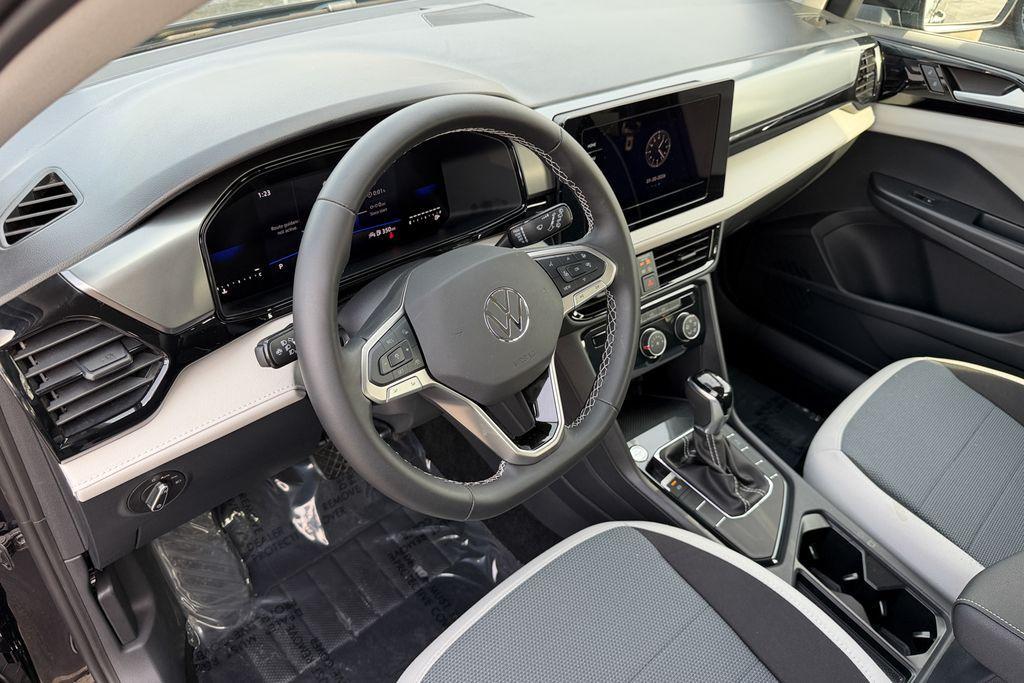 used 2025 Volkswagen Taos car, priced at $21,748