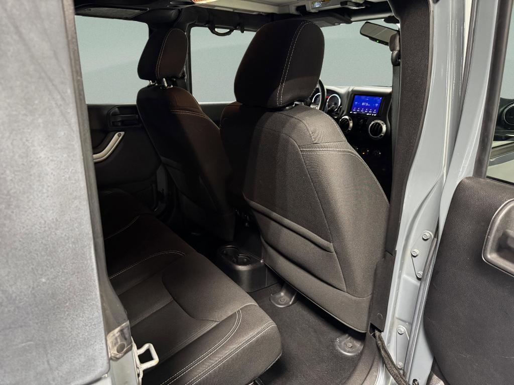 used 2015 Jeep Wrangler Unlimited car, priced at $17,791