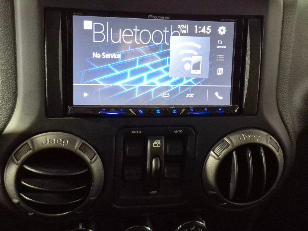 used 2018 Jeep Wrangler JK Unlimited car, priced at $21,695