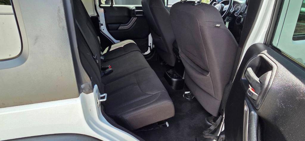 used 2014 Jeep Wrangler Unlimited car, priced at $15,995