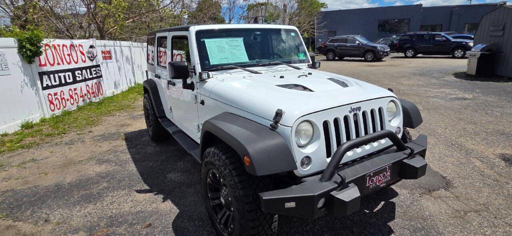 used 2014 Jeep Wrangler Unlimited car, priced at $15,995