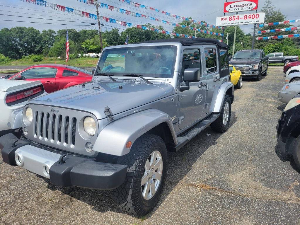 used 2014 Jeep Wrangler Unlimited car, priced at $12,995
