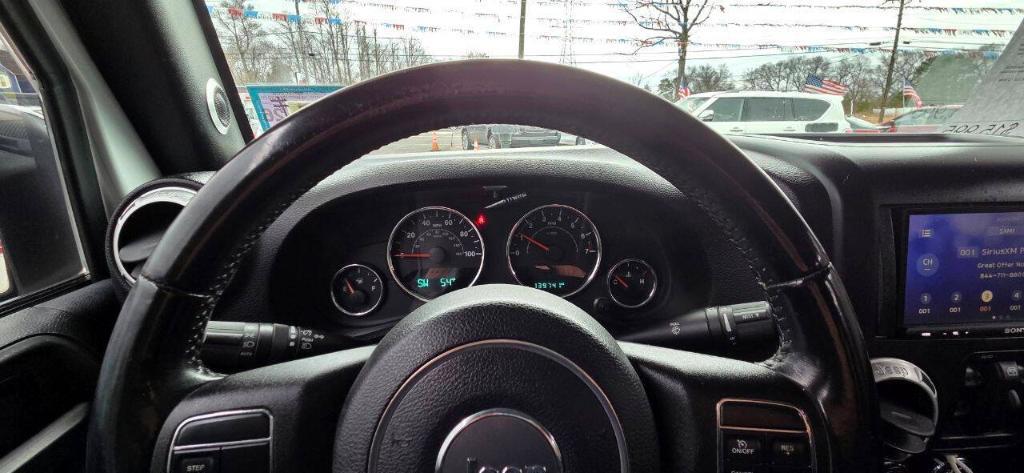 used 2015 Jeep Wrangler Unlimited car, priced at $15,995