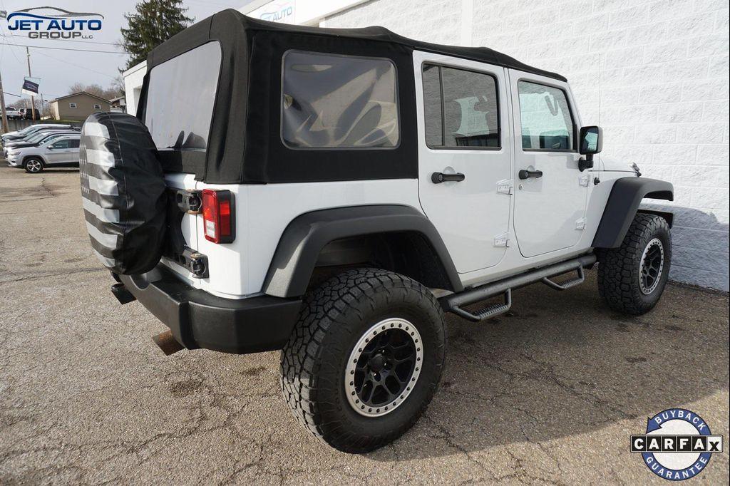 used 2018 Jeep Wrangler JK Unlimited car, priced at $19,977