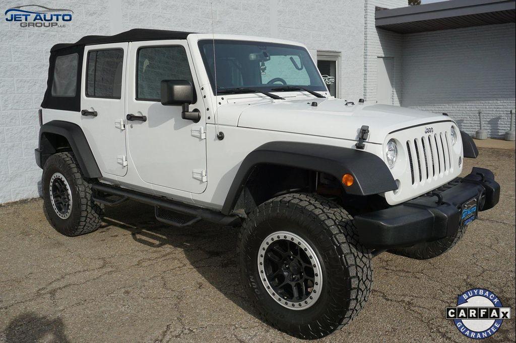 used 2018 Jeep Wrangler JK Unlimited car, priced at $19,977