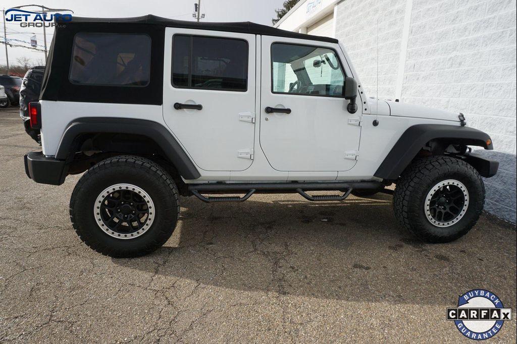 used 2018 Jeep Wrangler JK Unlimited car, priced at $19,977