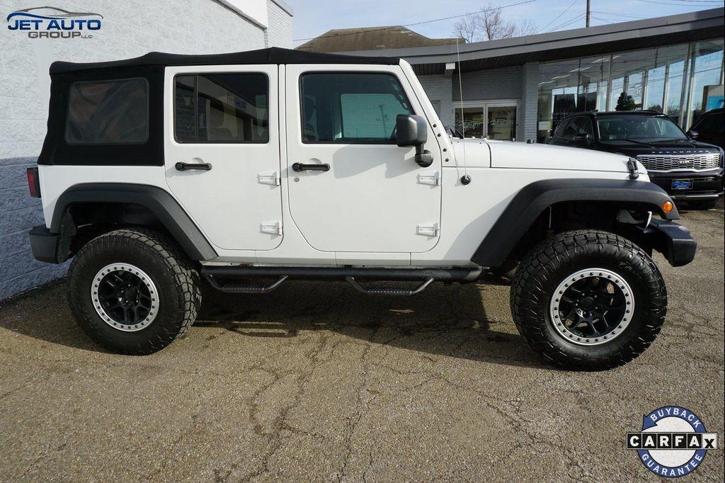 used 2018 Jeep Wrangler JK Unlimited car, priced at $19,977
