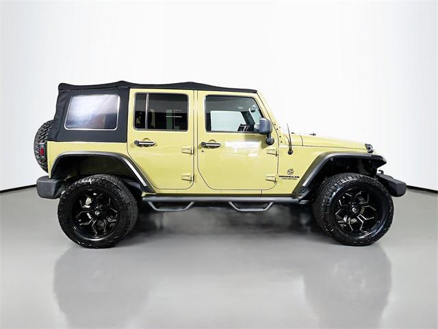 used 2013 Jeep Wrangler Unlimited car, priced at $15,170