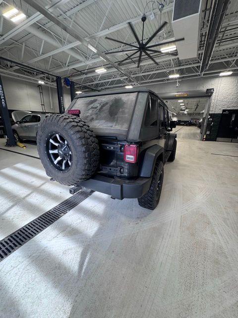 used 2013 Jeep Wrangler Unlimited car, priced at $12,997