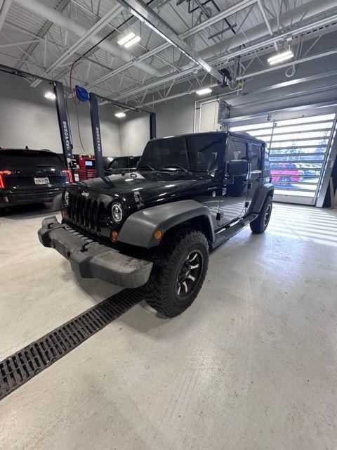 used 2013 Jeep Wrangler Unlimited car, priced at $12,997