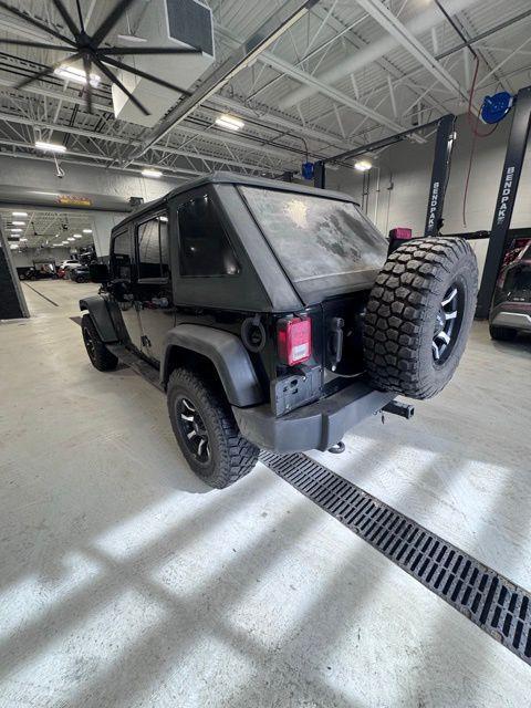 used 2013 Jeep Wrangler Unlimited car, priced at $12,997