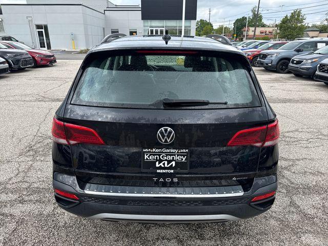 used 2024 Volkswagen Taos car, priced at $22,946
