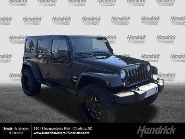 used 2014 Jeep Wrangler Unlimited car, priced at $21,789
