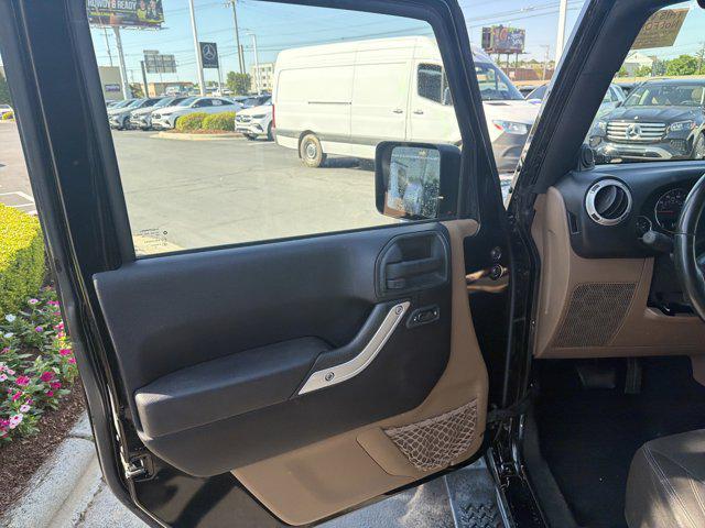 used 2014 Jeep Wrangler Unlimited car, priced at $21,789