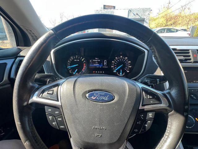 used 2015 Ford Fusion car, priced at $7,499