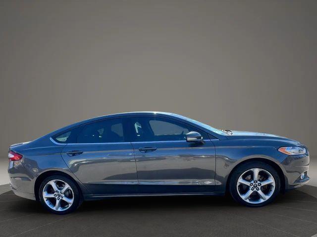 used 2015 Ford Fusion car, priced at $7,499