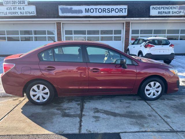 used 2014 Subaru Impreza car, priced at $6,499
