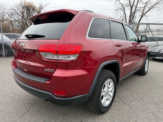 used 2014 Jeep Grand Cherokee car, priced at $7,799