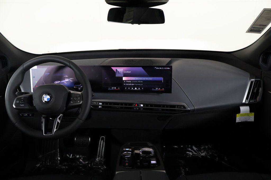 new 2026 BMW iX car, priced at $107,095