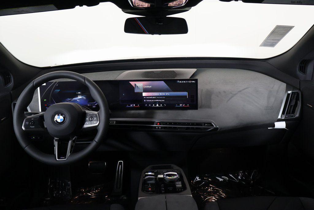 new 2026 BMW iX car, priced at $95,195