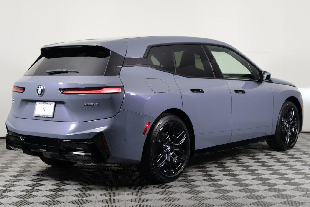 new 2026 BMW iX car, priced at $95,195