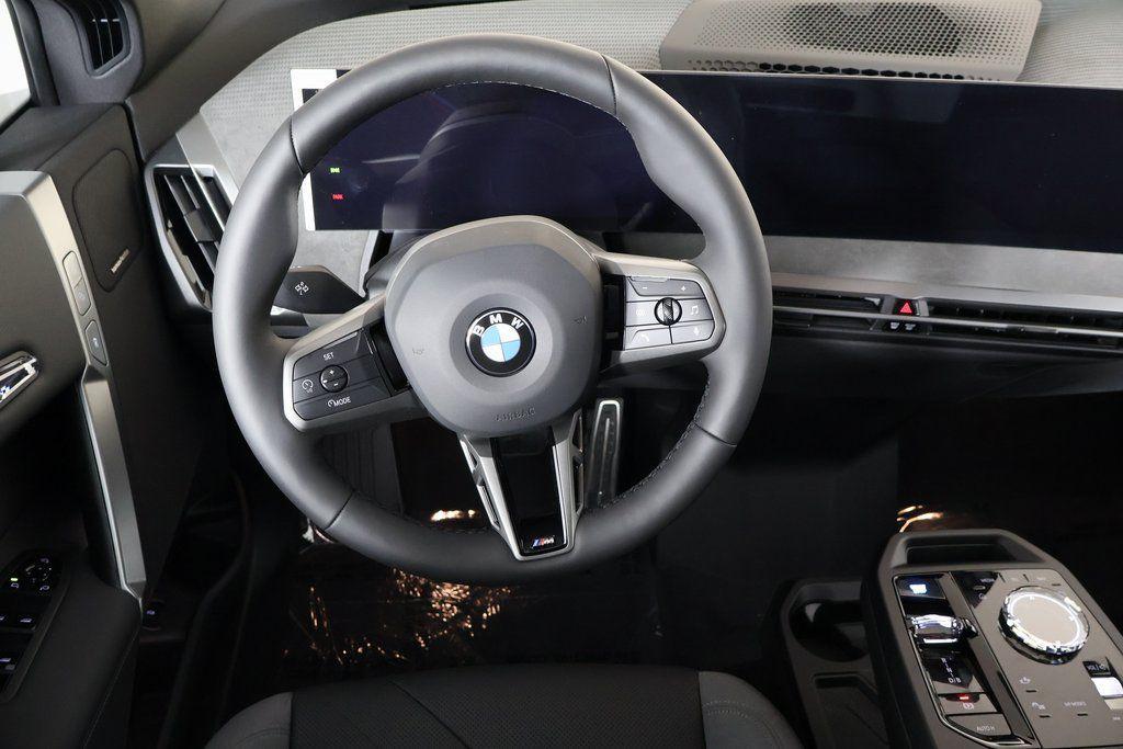 new 2026 BMW iX car, priced at $103,595
