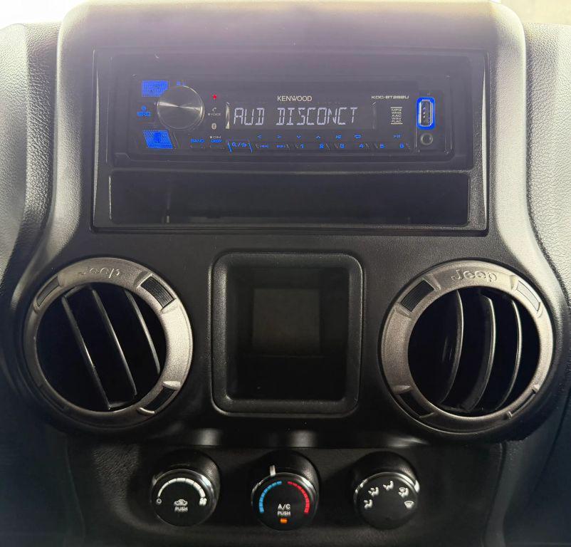 used 2011 Jeep Wrangler Unlimited car, priced at $12,895