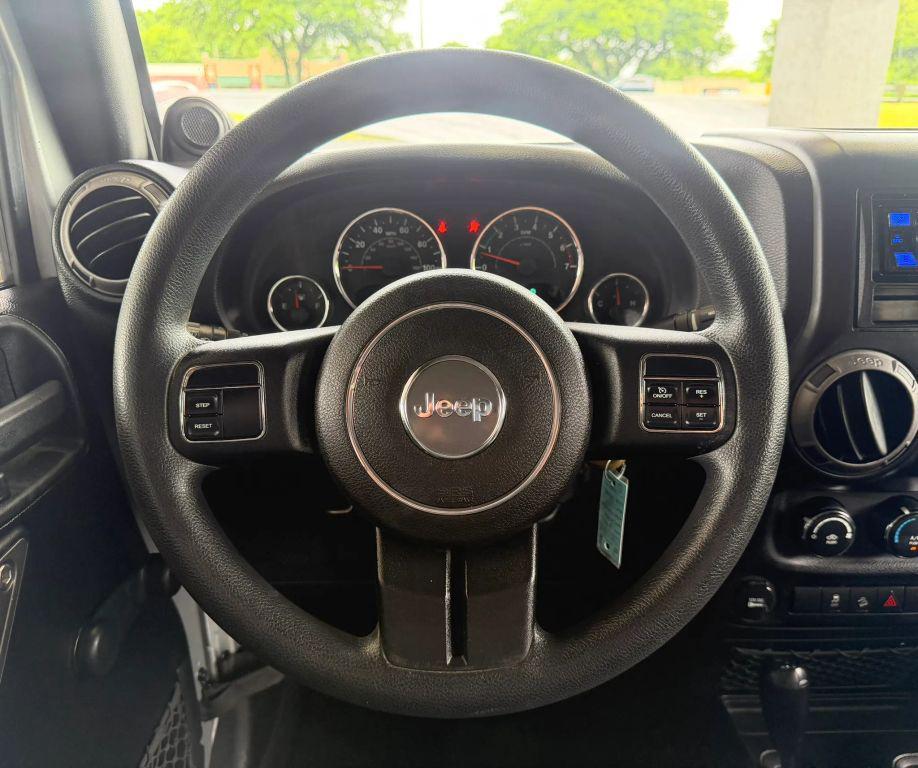 used 2011 Jeep Wrangler Unlimited car, priced at $12,895