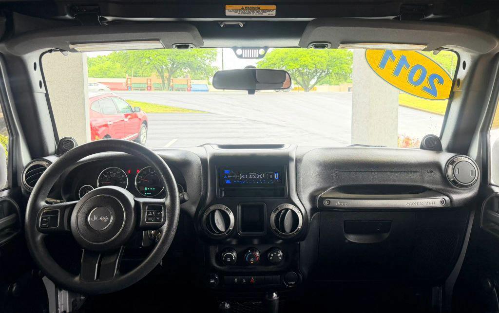 used 2011 Jeep Wrangler Unlimited car, priced at $12,895