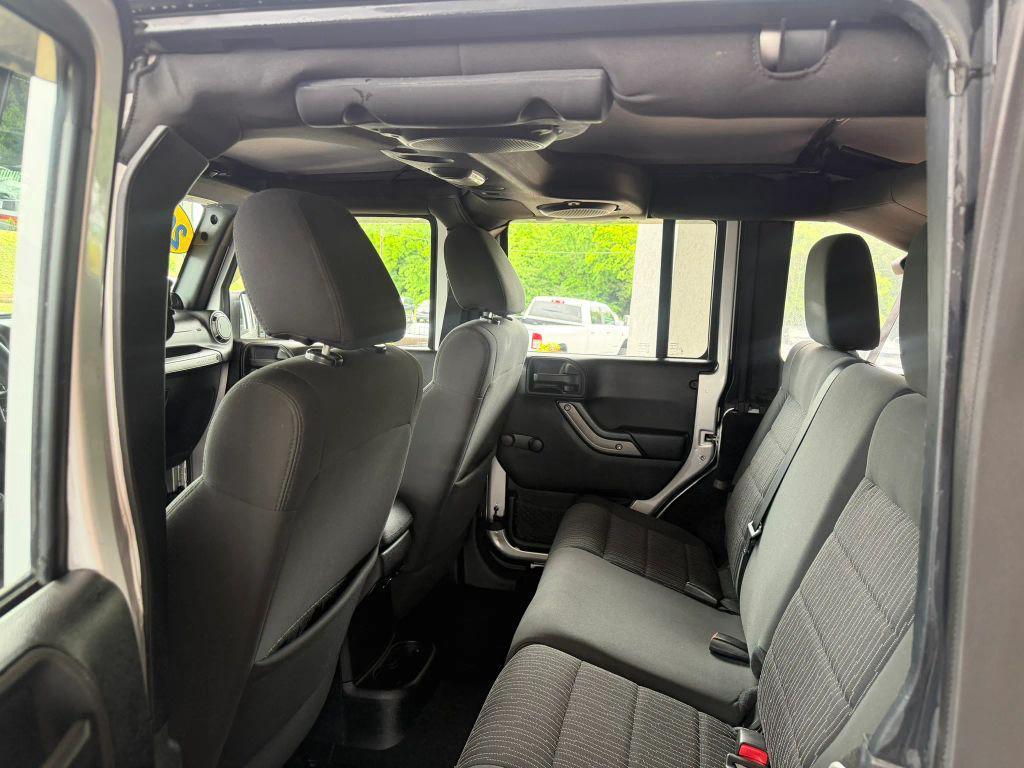 used 2011 Jeep Wrangler Unlimited car, priced at $12,895