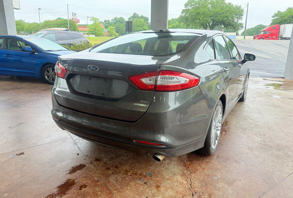 used 2016 Ford Fusion car, priced at $8,595