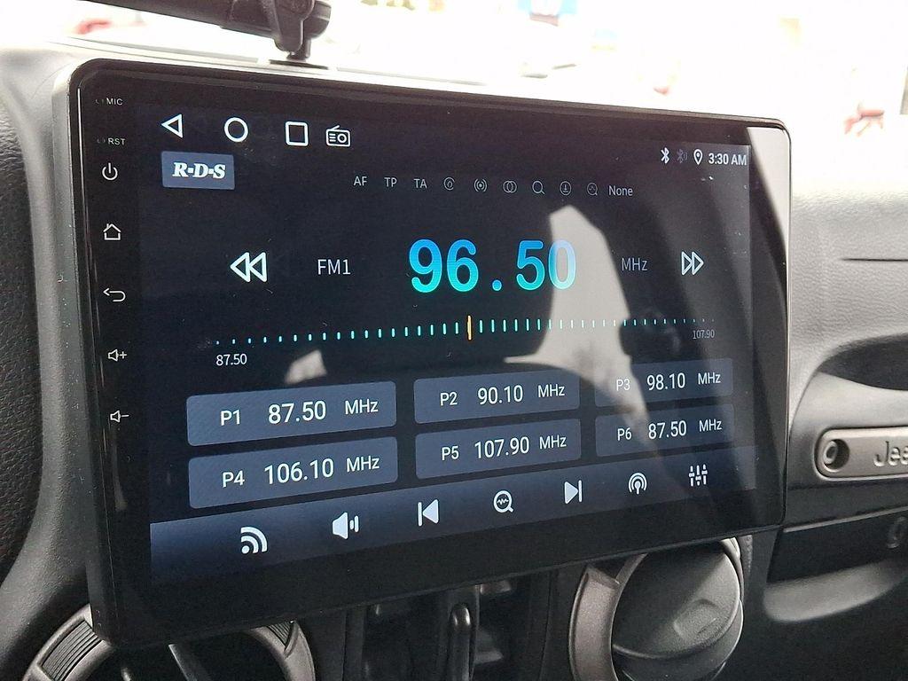 used 2015 Jeep Wrangler Unlimited car, priced at $11,995