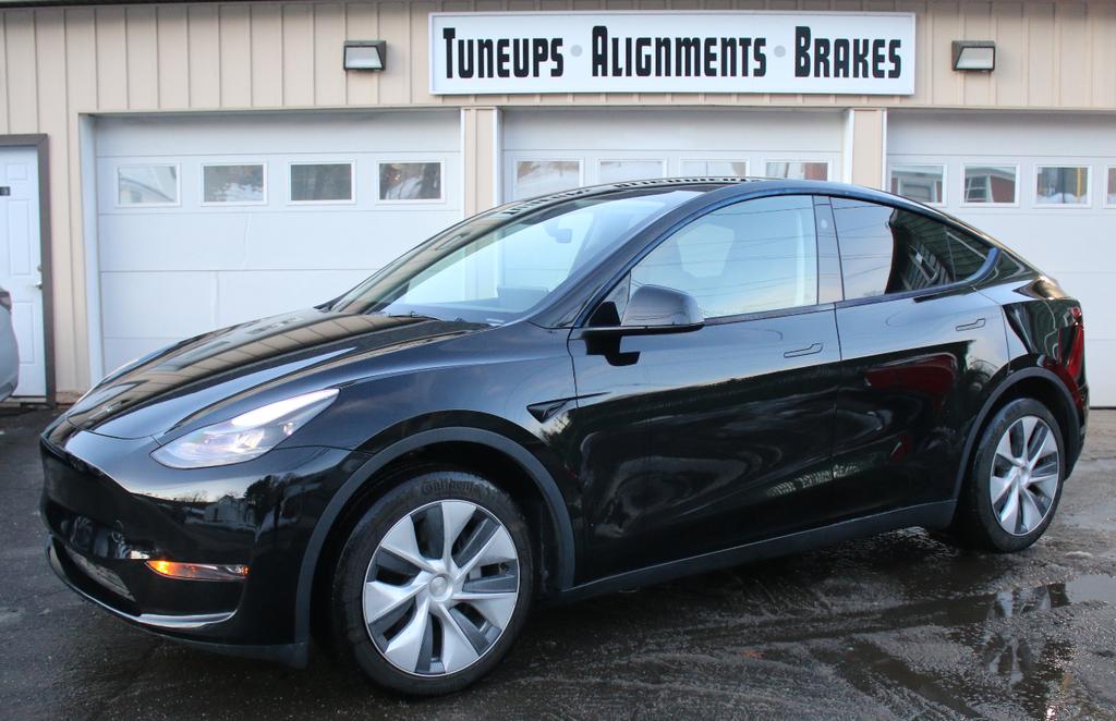 used 2024 Tesla Model Y car, priced at $30,900