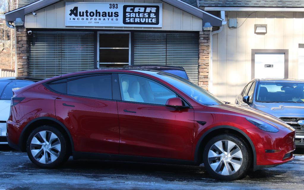 used 2023 Tesla Model Y car, priced at $29,900