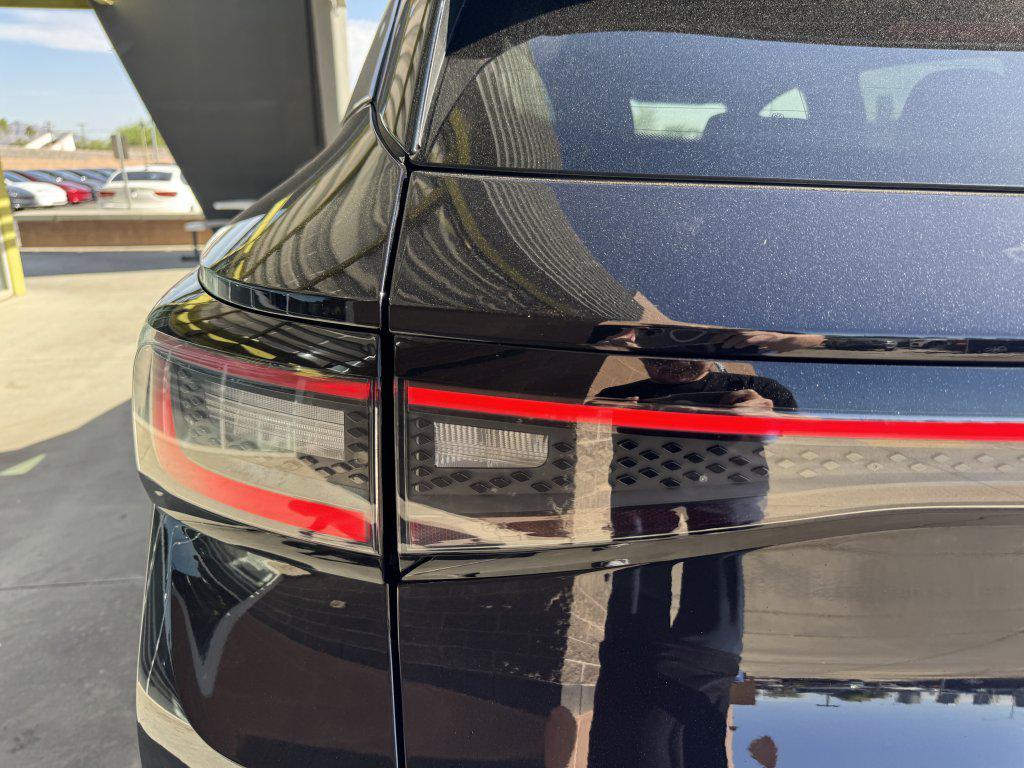 used 2023 Volkswagen ID.4 car, priced at $25,977