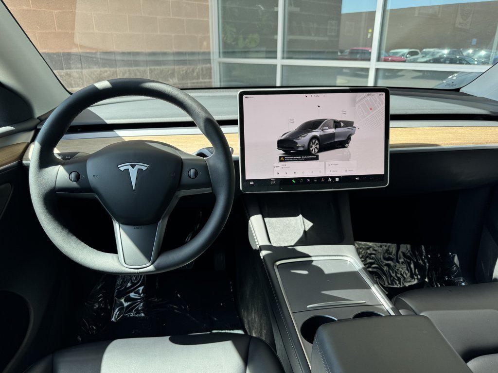 used 2023 Tesla Model Y car, priced at $31,277