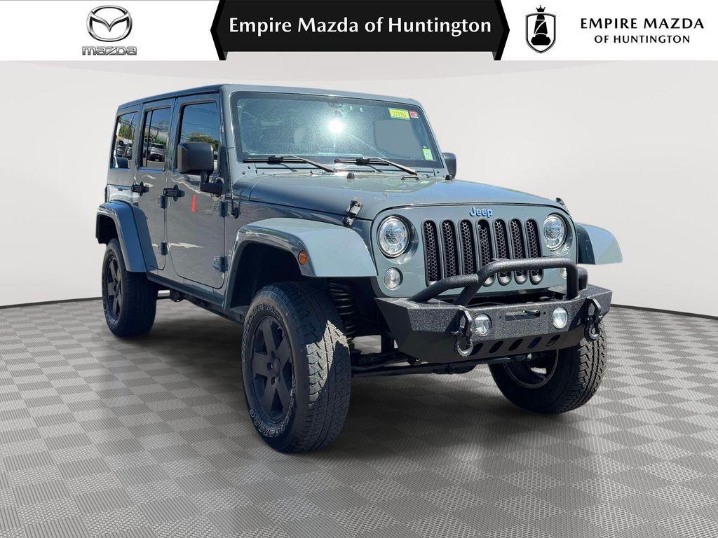used 2015 Jeep Wrangler Unlimited car, priced at $13,721