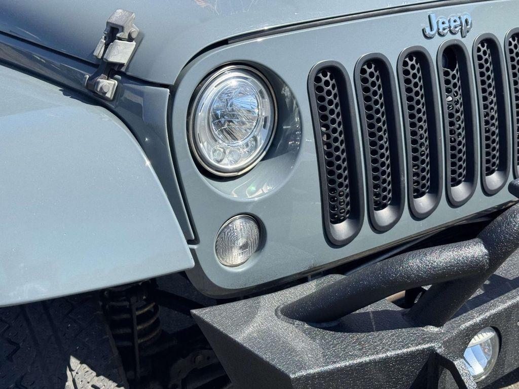 used 2015 Jeep Wrangler Unlimited car, priced at $13,721